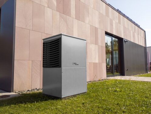 modern heat pump unit installed outside a home in Glendale Arizona desert setting